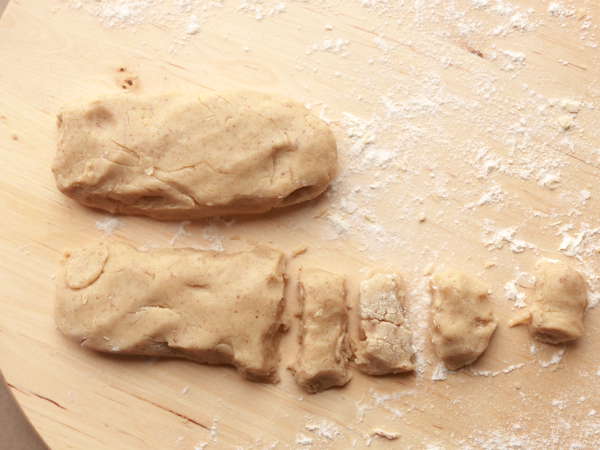 Divide the dough into 24 equal pieces for the mini pecan pumpkin pie crust