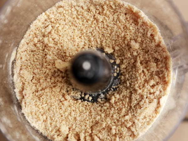 Mix the dry ingredients with butter to get a coarse meal for the mini pecan pumpkin pie crust.