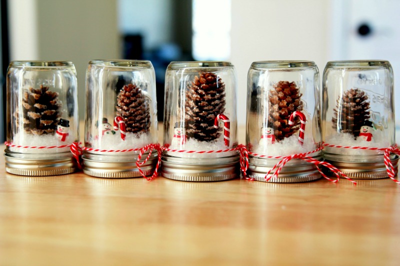 DIY Mason Jar Waterless Snow Globe as party favor for Winter Wonderland Birthday Party Theme