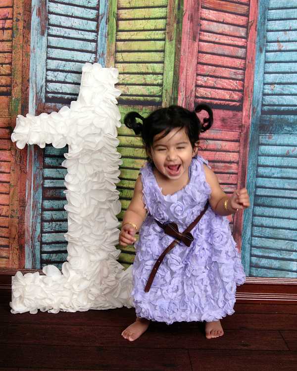 Akira in her First Birthday Photo-shoot with Number 1 Photo Prop