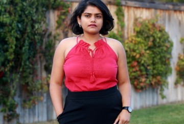 Pleated Midi Skirt with Tall Riding Boots and a Halter Top