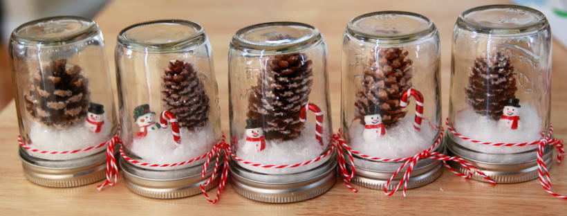 DIY Mason Jar Waterless Snow Globe as party favor for Winter Wonderland Birthday Party Theme