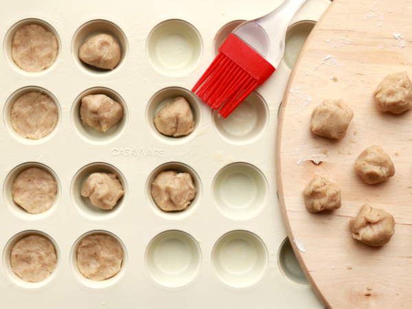 Set the dough in the muffin cups to back the mini pecan pumpkin pie crust