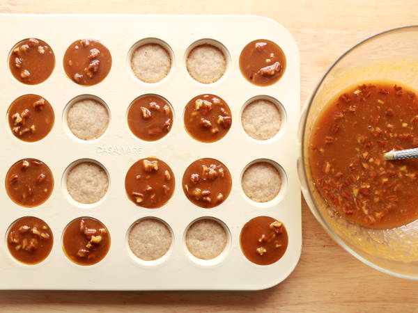 Mini pecan pumpkin pie before going into the oven.