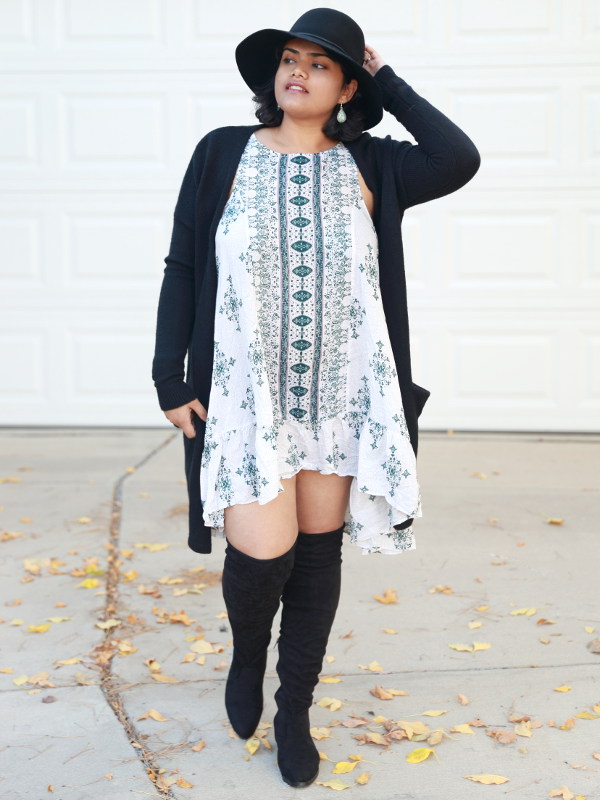Free People Boho Printed Slip Dress with swingy silhouette and ruffle hem, worn with long cardigan and over the knee boots.