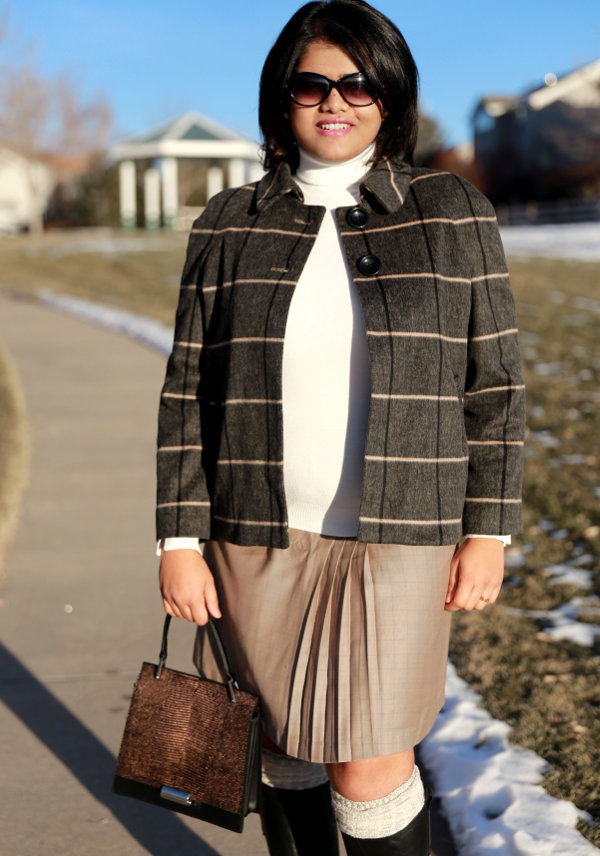 Mix patterns like plaid on plaid. Wearing a fine plaid pleated skirt with big plaid wool blazer.