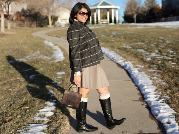 Mix patterns like plaid on plaid. Wearing a fine plaid pleated skirt with big plaid wool blazer.