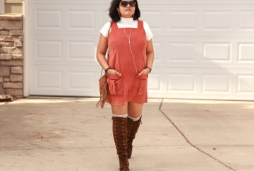 ASOS Orange Corduroy Overall Dress pairs well with a contrasting cream high neck t-shirt and cardigan.