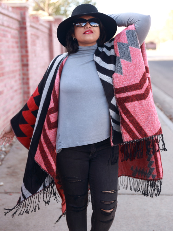South western tribal print poncho brings the vibrancy of the spring and fluidity of the spring breeze. Pair it with distressed denim and high heels for a city chic outfit.