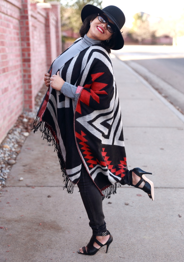 South western tribal print poncho brings the vibrancy of the spring and fluidity of the spring breeze. Pair it with distressed denim and high heels for a city chic outfit.