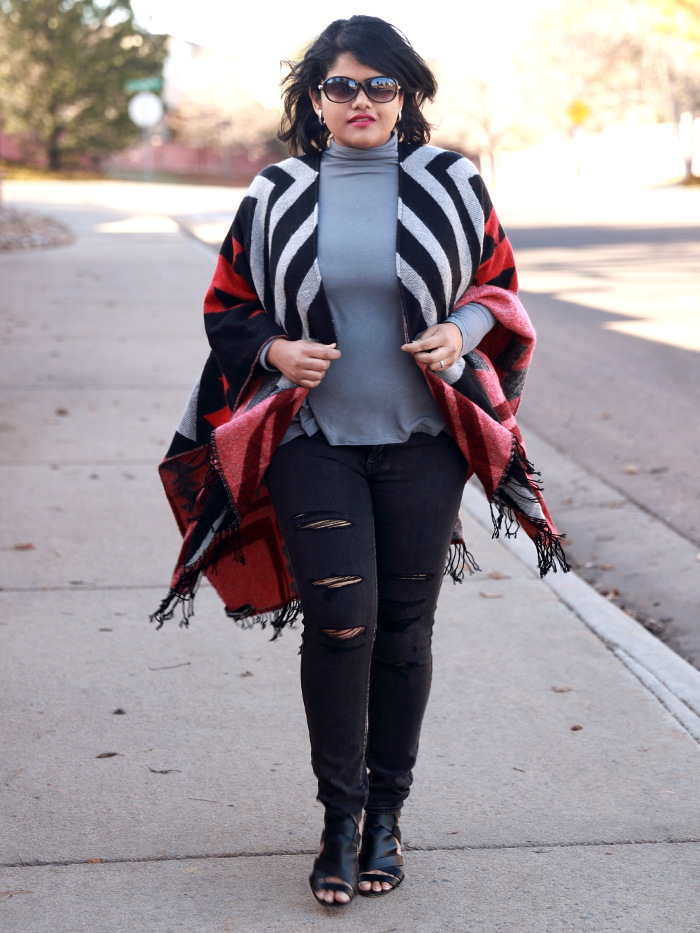 South western tribal print poncho brings the vibrancy of the spring and fluidity of the spring breeze. Pair it with distressed denim and high heels for a city chic outfit.