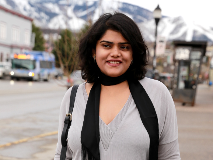 A walk in the downtown Steamboat Springs in relaxed leggings and V-neck top. Wearing a skinny scarf instead of a necklace to give a chic neck coverage.