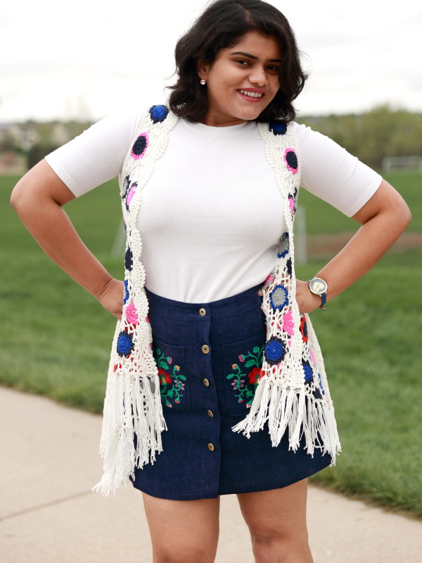 You are your own rainbow. Embroidered Pocket A Line Skirt with Boho Patchwork Crochet Swing Cardigan makes for a vibrant and colorful outfit.