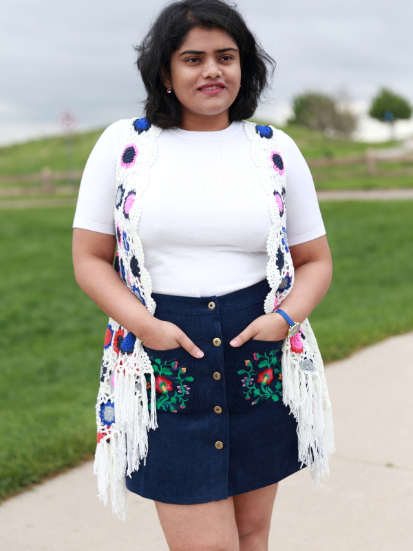 You are your own rainbow. Embroidered Pocket A Line Skirt with Boho Patchwork Crochet Swing Cardigan makes for a vibrant and colorful outfit.