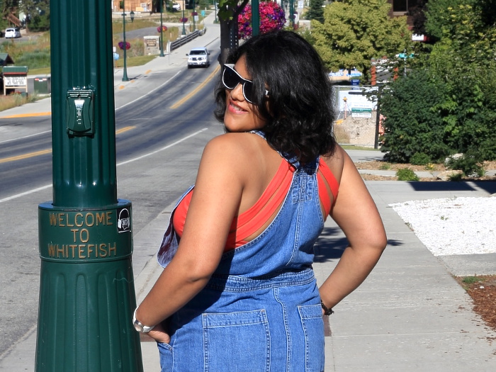 Wearing ASOS blue denim overall dress with Fabletics red sports tank top. How cute is the this back!
