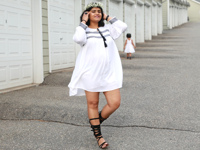 Feeling like a Greek goddess with gladiator sandals, floral crown and and white tunic dress with tassels.