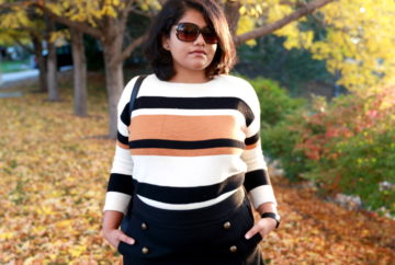 Striped sweater is a fall essential just like a striped tee is for summer. Wear it with a short skirt and tall boots to create a fun or semi-formal look.