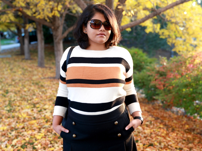 Striped sweater is a fall essential just like a striped tee is for summer. Wear it with a short skirt and tall boots to create a fun or semi-formal look.