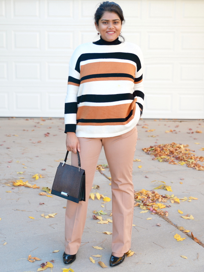 Striped sweater is a fall essential just like a striped tee is for summer. For a cold day, layer it with a mock neck top or coat. Wear it with trousers to create a formal office look.