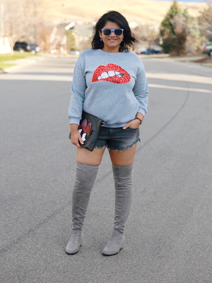 How to wear shorts in cold weather! Select a thicker fabric shorts like tweed, denim or leather and pair it with a cozy sweatshirt or sweater. Wear thigh high or over the knee boots to keep you warm. For extra layering add a scarf or jacket. This makes for a perfect street style.