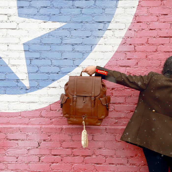 The Coach Metropolitan rucksack effortlessly blends vintage authenticity with modern function and style. A rugged silhouette crafted in durable sport calf leather, it's designed with an interior laptop sleeve, drawstring and buckle closures and adjustable shoulder straps for a custom fit. This leather backpack is not only a style statement but a great multi-purpose bag. You can use it on campus or travel or for backpacking.