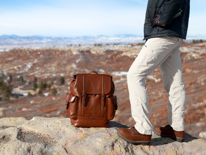 The Coach Metropolitan rucksack effortlessly blends vintage authenticity with modern function and style. A rugged silhouette crafted in durable sport calf leather, it's designed with an interior laptop sleeve, drawstring and buckle closures and adjustable shoulder straps for a custom fit. This leather backpack is not only a style statement but a great multi-purpose bag. You can use it on campus or travel or for backpacking.